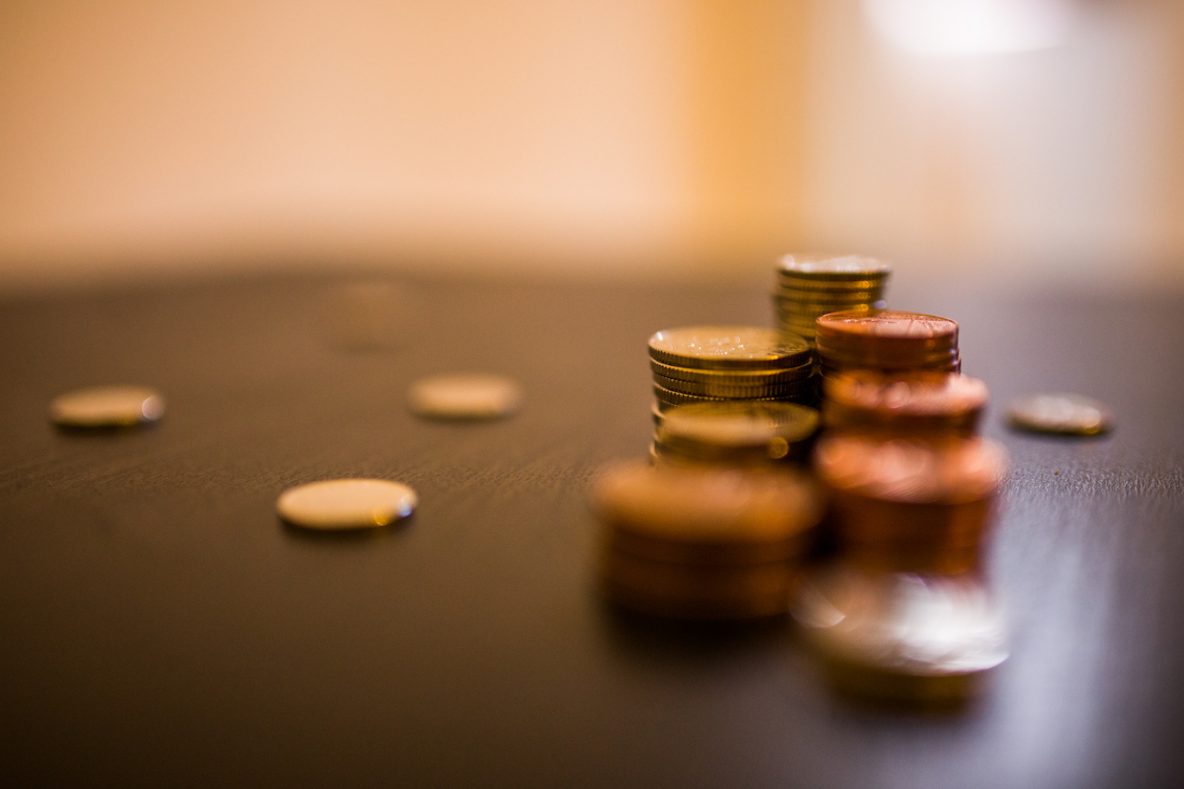 pile of coins for 2017 IRS mileage rate post