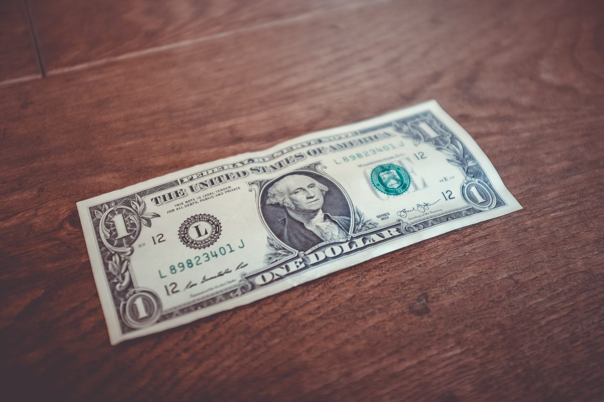 2023 mileage reimbursement rates - dollar on a table image